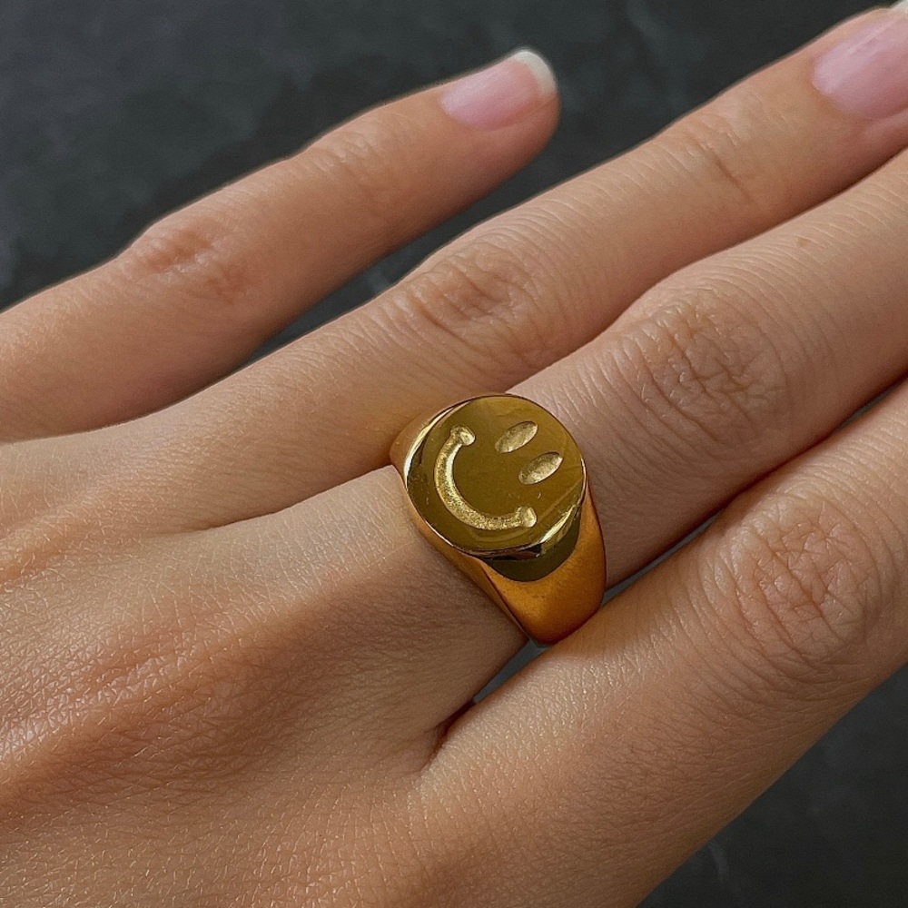 Gold smiley face ring size 7 BRAND NEW just too big for me.